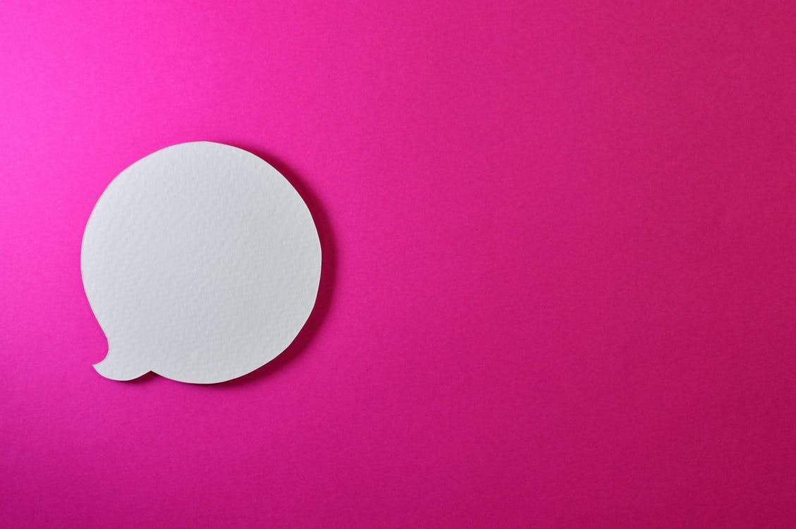 Speech bubble on a pink background